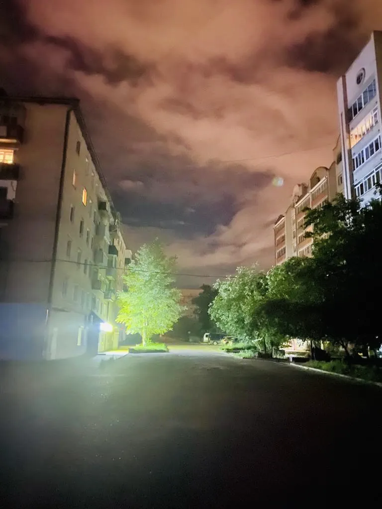 Город